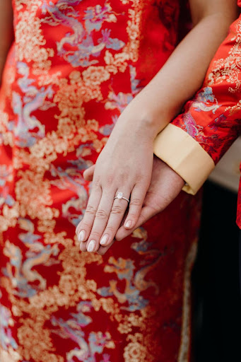 Traditional Wedding Cakes - Couple Wearing Wedding Ring