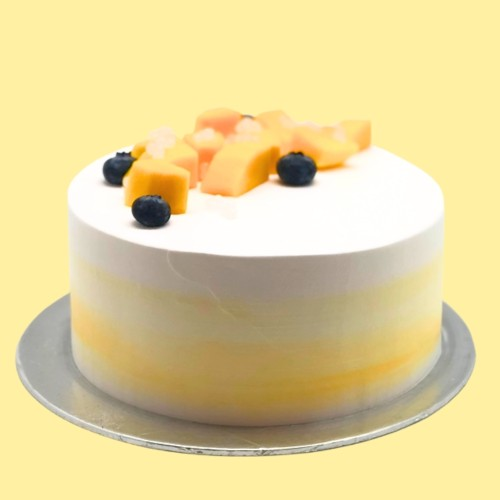 Mango pomelo sago cake with yellow background