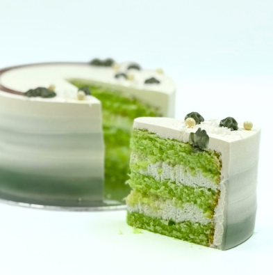 pandan cake with blue and white cream