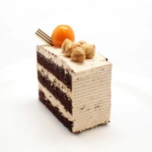 a hazelnut chocolate crunch sliced cake