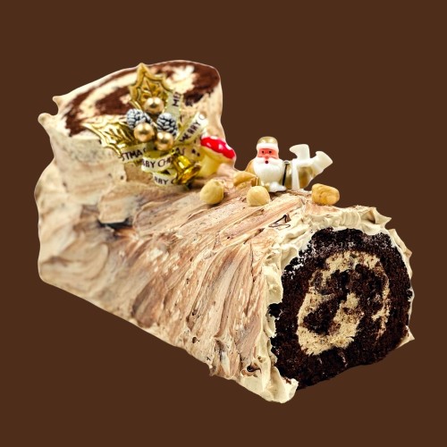 a hazelnut choco crunch log cake