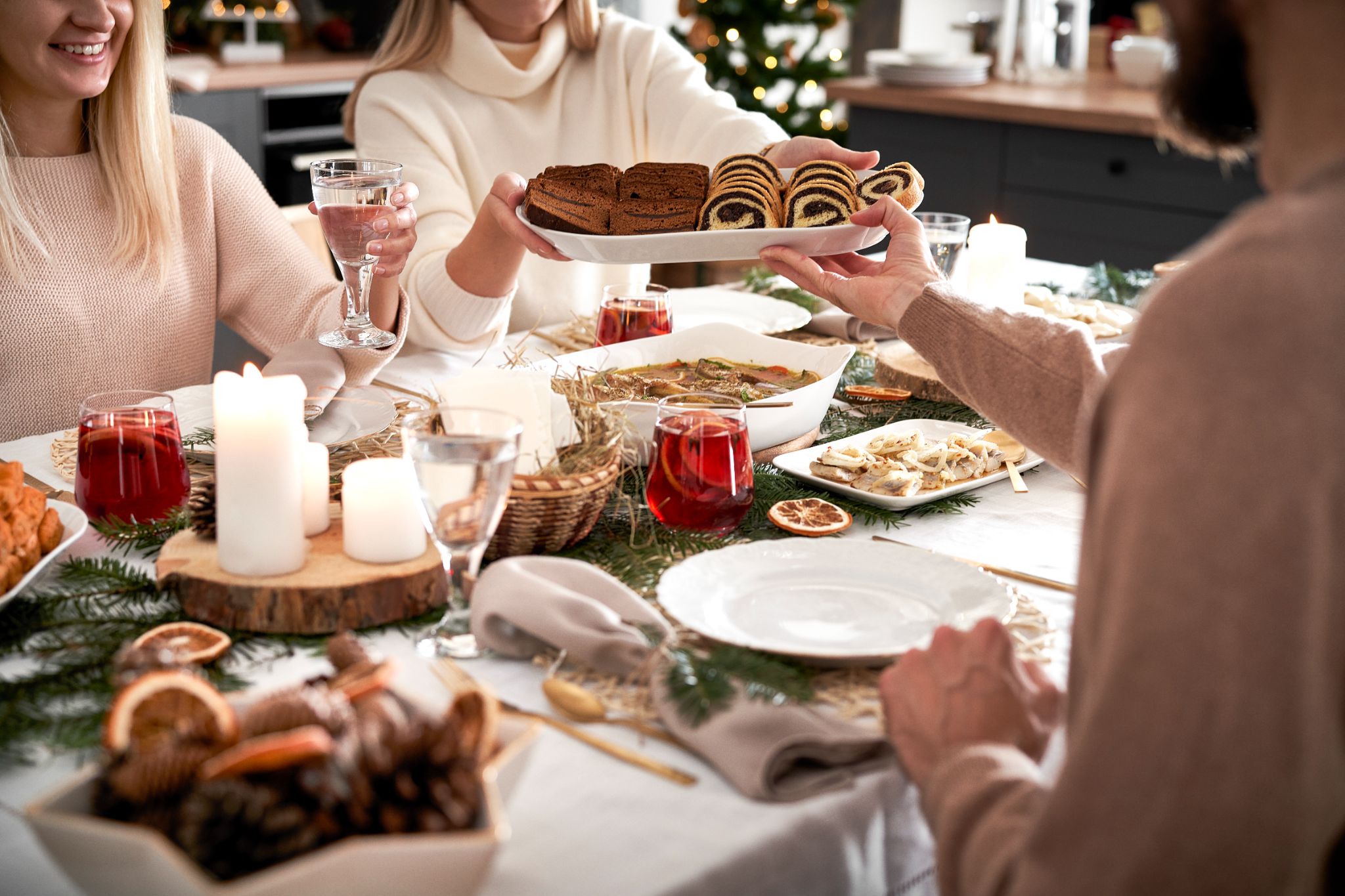 a family dinner passing cakes around