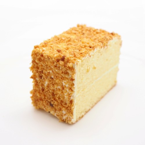 a slice of roasted peanut buttercream cake