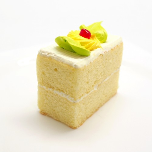 a slice of vanilla buttercream cake