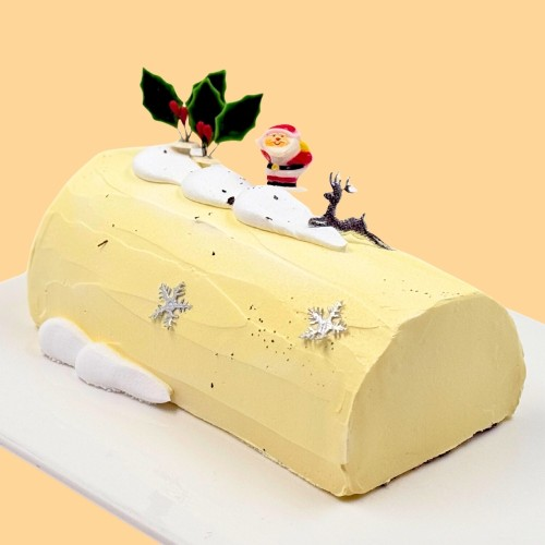 a sweet peach earl grey log cake